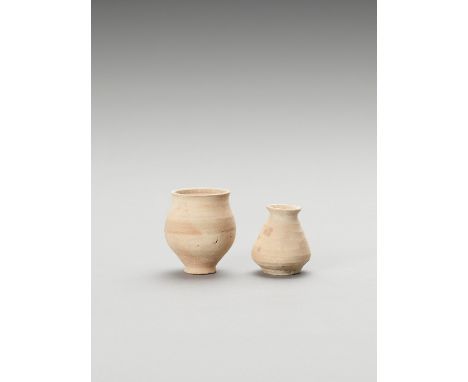   TWO EARLY MEHRGARH SMALL CERAMIC VESSELS  Indus Valley, Pakistan, Mehrgarh, Neolithic period (c. 5500 BC – 4500 BC). This l