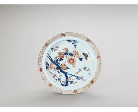   A LARGE IMARI PORCELAIN PLATE  China, Kangxi period (1662-1722). Painted in underglaze blue and overglaze iron-red and gold