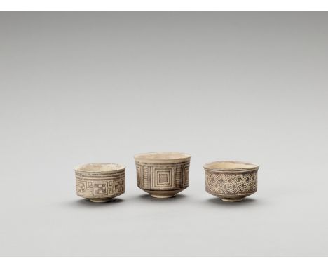   THREE DELICATE NAL CERAMIC WARE  Indus Valley, Pakistan, Nal culture (around 3100-2700 BCE). The lot consist of three carin