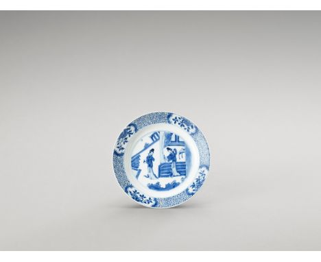   A BLUE AND WHITE PORCELAIN DISH  China, Kangxi period (1662-1722). The dish is decorated in underglaze blue on the show sid
