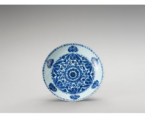   A LARGE BLUE AND WHITE PORCELAIN CHARGER  China, Kangxi period (1662-1722). Painted in underglaze blue with a central medal