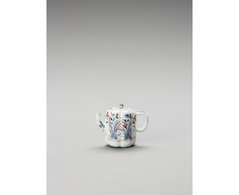   AN IMARI PORCELAIN TEAPOT WITH COVER  Japan, Edo period (1615-1868)    Hexagonally lobed and with rounded handle, painted i