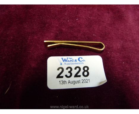 A 375 gold tie clip with engine turned decoration.