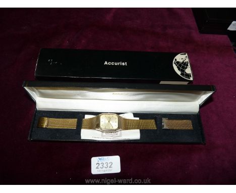 A Gents Accurist wristwatch with gold coloured strap, square face.