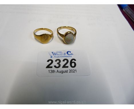 A very small size 9 ct gold signet ring and another gold ring set with an Opal.