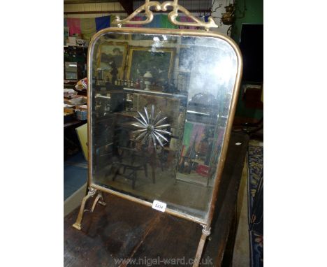 A Brass mirrored Firescreen.