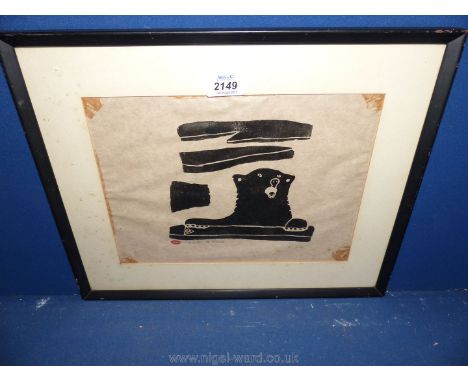 An Eskimo Art woodblock Print of Bear &amp; Shoes, signed 'Miemaw 1.3.40'.