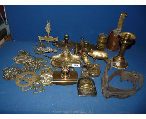 A quantity of brass including horse brasses, blotter, ink stand with ceramic liner and chambersticks, plus copper measures an