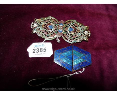 Two Art Deco style enamel belt buckles; one hexagonal, the other floral. Some damage to the enamel.