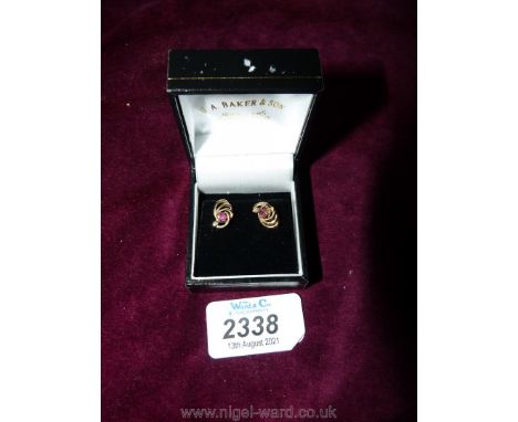 A pair of 9ct gold ruby and diamond ear-rings.