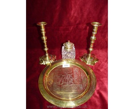 A small Brass circular tray with Moorish style decoration, 10 1/2'' diameter, a heavy glass inkwell with brass hinged lid (lo