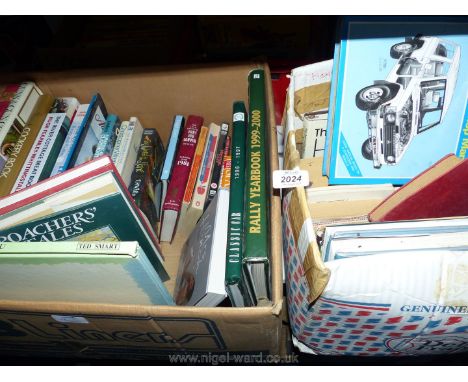 Two boxes of books to include; Haynes Mitsubishi Shogun manual, Jensen Button, Rally Year Book 1999-2000, cookbooks, etc.