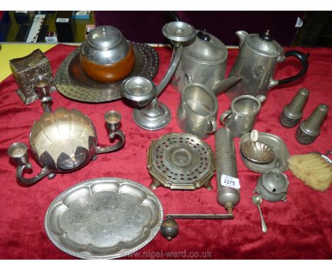 A quantity of Pewter items including hammered three piece Teaset, tea caddy, pepper grinder, candle holders etc.