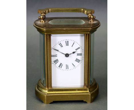A French brass cased carriage timepiece, the case with domed sides, detailed Harrods, London, Made in Paris to the reverse, t