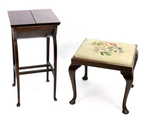 An Edwardian mahogany square sewing table, with a divided hinged fold over top, on curved legs, 37cm x 72cm high, and two mah