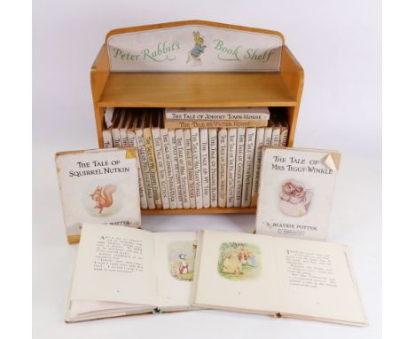 Peter Rabbit's Book shelf containing 28 volumes of Beatrix Potter Peter Rabbit books (29).