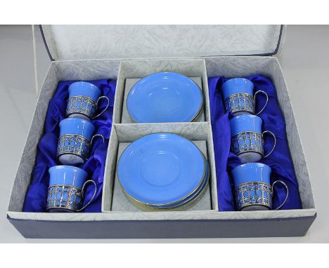 A George V silver and Shelley porcelain coffee set for six, the pierced silver cup holders by Elkington & Co, Birmingham 1919
