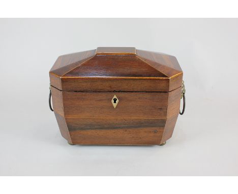 A George III sarcophagus shaped tea caddy with lion mask ring handles and two-division interior with lids (a/f), 22cm