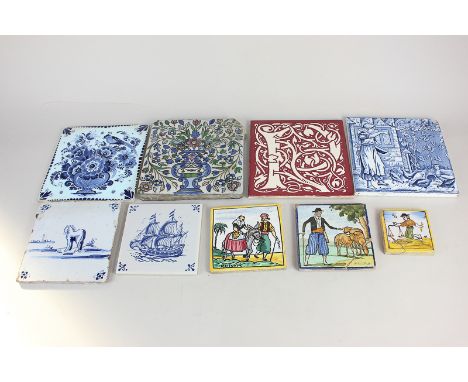 Nine various ceramic wall tiles including Wedgwood, Delft and faience examples