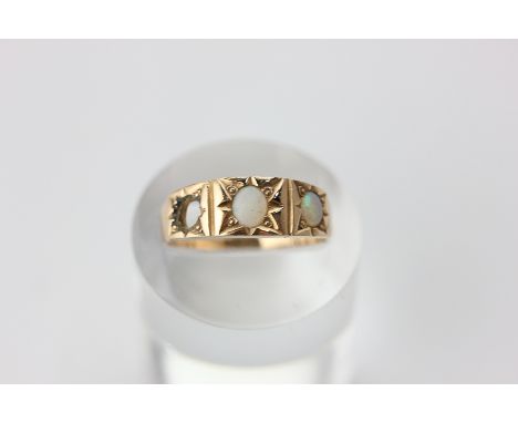 An 18ct gold and opal ring (one stone missing)