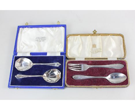 An Elizabeth II silver cased christening set of fork and spoon, maker Emile Viner, Sheffield 1961, together with a cased set 