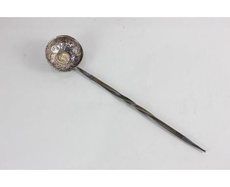 A Georgian coin inset toddy ladle with twisted whalebone handle, the coin a 1758 gilded shilling, 30cm