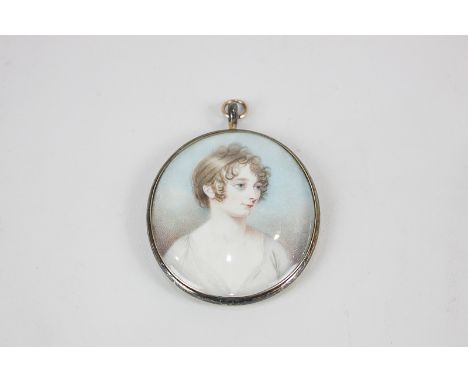 A 19th century oval portrait miniature of a woman in white dress, 8cm by 6.5cm