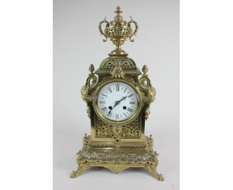 A 19th century brass cased mantel clock by Ernest Miroy, the dial with Roman numerals, the movement stamped MR & Co (Miroy-Re