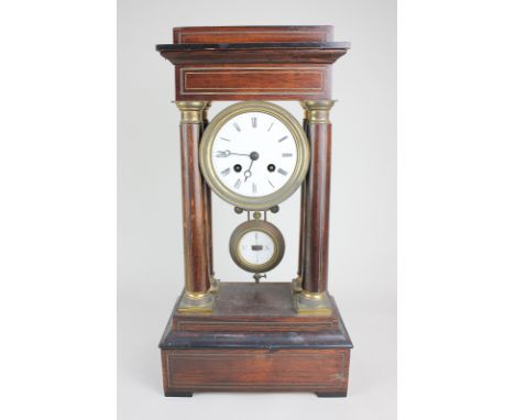 A 19th century rosewood and brass Portico clock, the circular dial with Roman numerals, the movement marked G & C, striking o