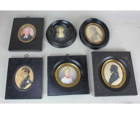A collection of six 19th century oval miniature portraits, including a silhouette profile portrait of a gentleman, paper labe