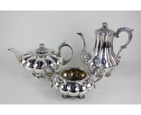 A George IV silver teapot, melon form with cast scroll handle, on pedestal foot, maker Richard Pearce, London 1825, 23.5oz, a