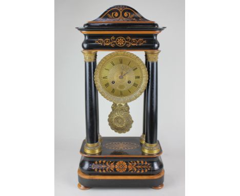 An early 19th century Empire Portico clock by William Connell, Cheapside, London, the ebonised case with inlaid floral scroll