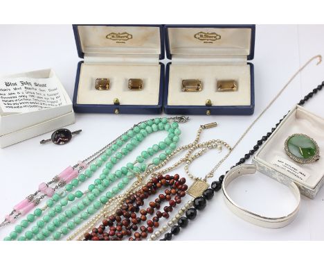 A 9ct gold St Christopher pendant, a silver bangle, and miscellaneous items