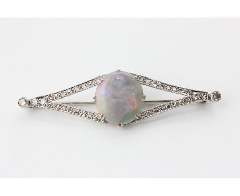 An opal and diamond brooch, claw set with an oval opal in a pierced lozenge shape mount set with single cut diamonds and coll