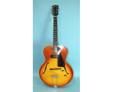 A Gibson ES-125 P90 hollow body electric guitar, serial number 363565, in fitted case, together with a Pearl BAS 300 amplifie