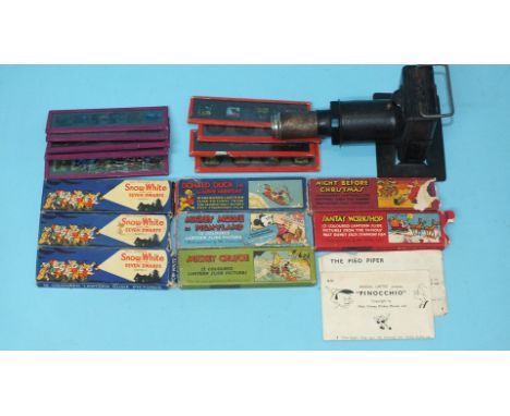Eight boxed sets of two lantern slides by Ensign Ltd for Walt Disney, ten loose slides, similar and a metal toy projector wit