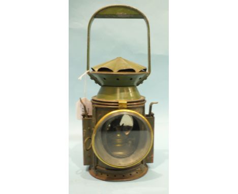 An Army two-aspect hand lamp marked 'JA2348, [arrow], GP Ltd, 1951', with burner, reservoir, reflector and one glass.