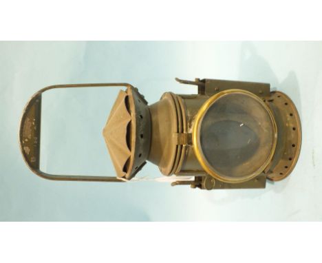 An Army two-aspect hand lamp marked 'CE & S [arrow] 1955, 2348', with burner, reservoir, reflector and both glasses.