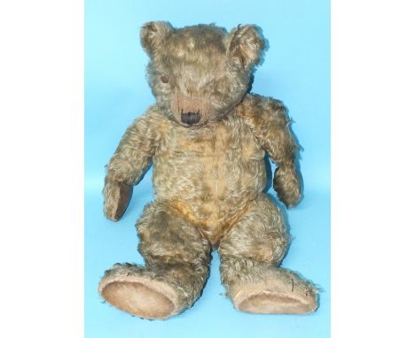 A Chiltern Hugmee teddy bear, c1930's, no eyes, shaved muzzle with vertically-stitched nose, mouth and paws, blonde mohair pl