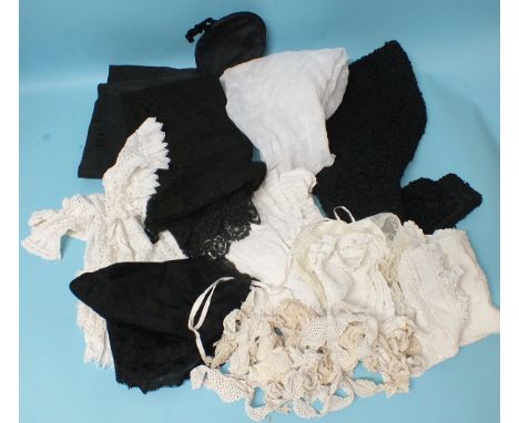 A black 'Blonde' lace shawl, 172 x 177cm, a white-work shawl and other textiles.