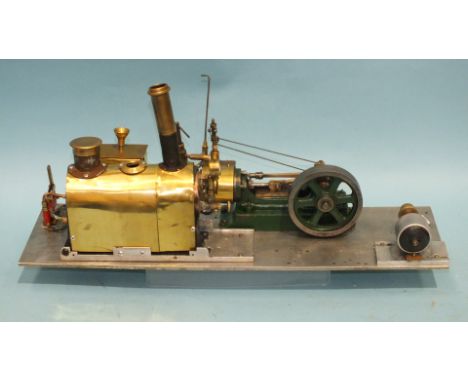 A live steam horizontal stationary engine, metal base 15 x 52.5cm, funnel 22cm high, (untested).