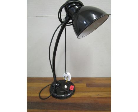After Christian Adele, a 1930s swan neck desk lamp and enamel shade in black, rewired and PAT tested 