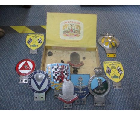 A collection of vintage car badges to include Bugatti owners club, The Vintage Sports Car Club, AA, BARC and others 