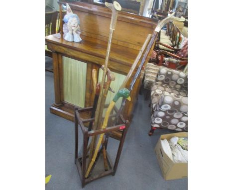 Walking sticks to include horned examples and a 1930's oak stick stand 