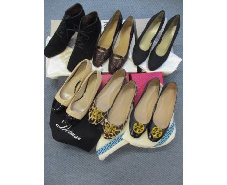 Five pairs of ladies shoes to include two pairs of Tory Burch low heeled shoes with circular yellow metal toe motifs, a pair 