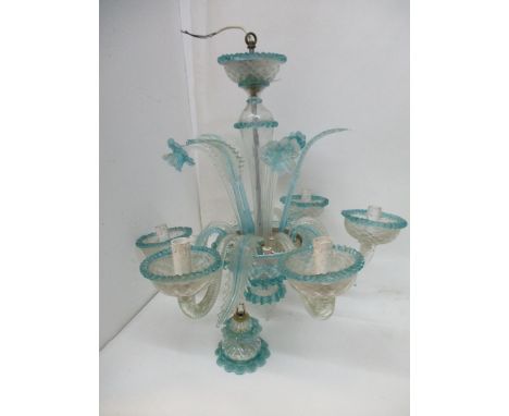 An Italian traditional style, five branch chandelier, probably Salviati, in clear and light blue glass, with daffodil and lea