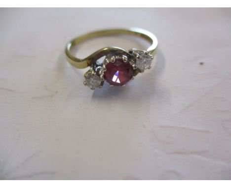 A 9ct gold diamond and ruby ring 
