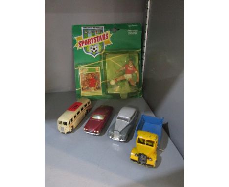 A group of four mid 20th century Dinky and Corgi diecast vehicles to include a Corgi Jaguar Mark X saloon in cerise colourway