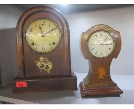 Two early 20th century mantle clocks, to include a American oak cased eight day clock and an Edwardian small mantle clock 