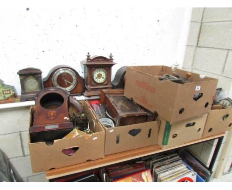 A large quantity of clocks and clock parts
